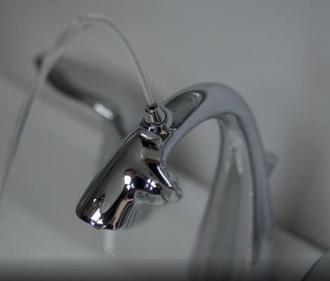 Top angle view of Nasoni fountain faucet in use.  Every day, we are inconvenienced by a faucet not designed to meet our needs and have simply accepted it without question.  We solve that problem with our award-winning fountain faucets. Make life easier.