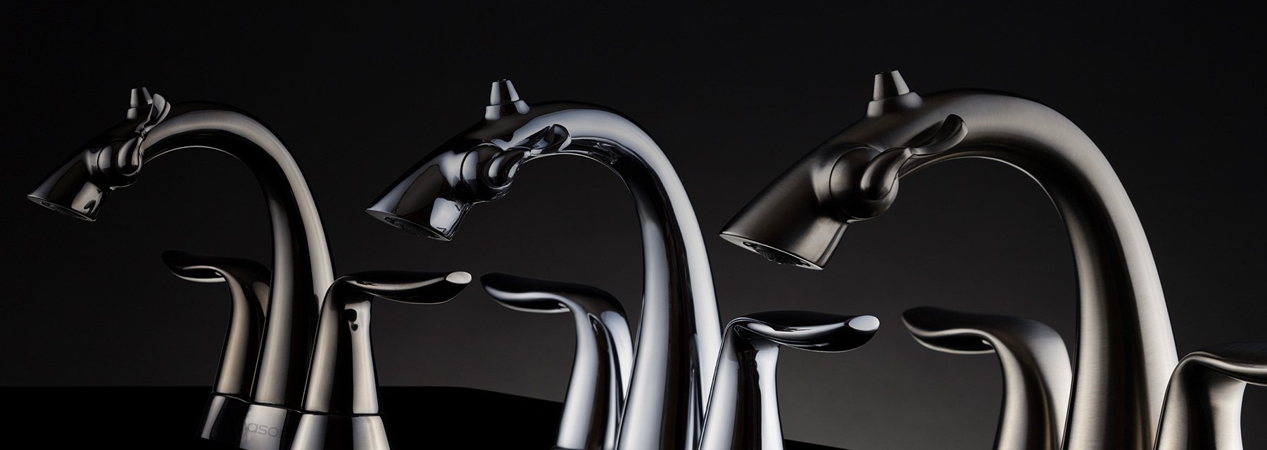 Group of centerset Nasoni fountain faucets on black background